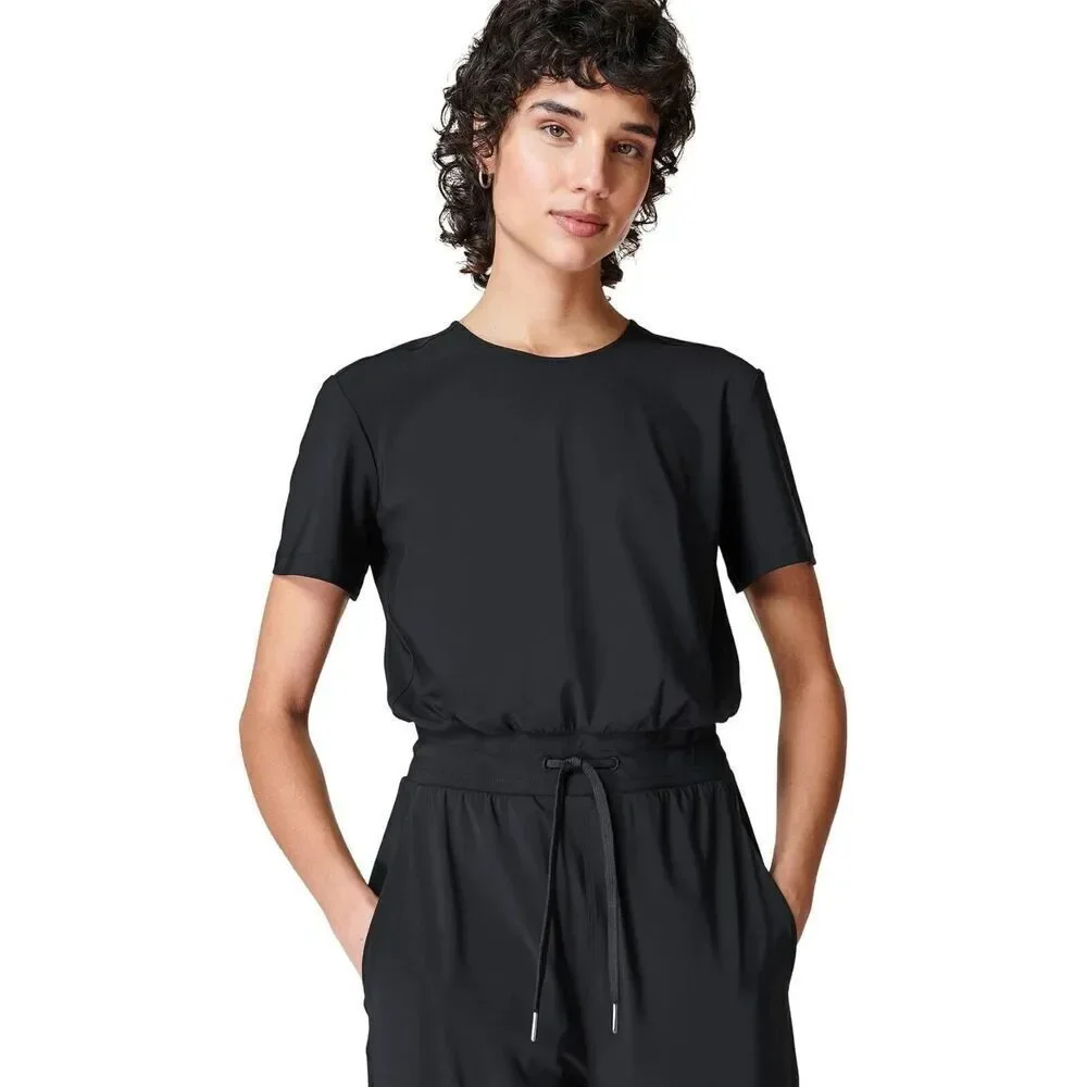 NWT's Sweaty Betty L71809 Womens Black Explorer Short Sleeve Jumpsuit 29” Sz L U